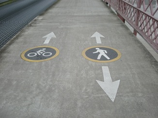 Bike and Walk lane symbols on pathway